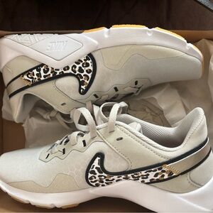 Nike Women's White and Cream Sneakers with Leopard Print